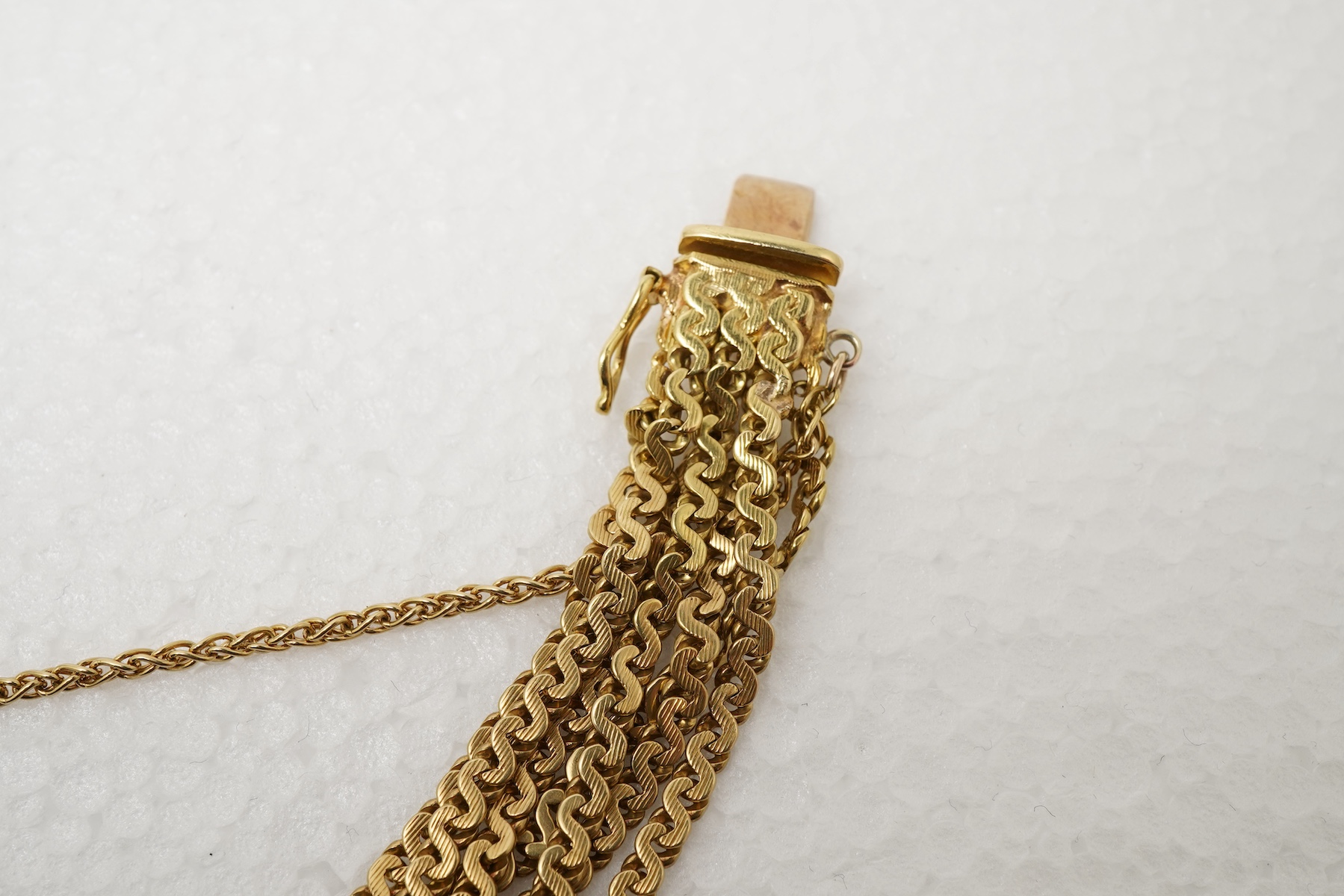 A gold bracelet, 1970s